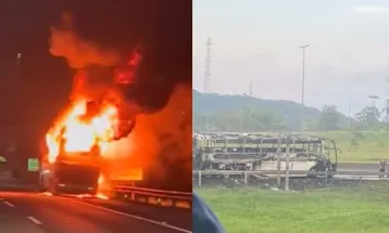 Ônibus da equipe Joinville Natação é destruído por incêndio na BR-101